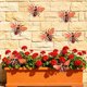thumbnail image 5 of Adorno colgante de hierro para jardín – Adorno de mariposa de metal pintado a mano para valla exterior, patio o terraza – Artesanía rústica resistente a la intemperie, 5 of 6