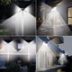 thumbnail image 2 of Juego de 2 focos solares con sensor de movimiento, 100 LED, luz solar de pared de cuatro lados, 2 of 4