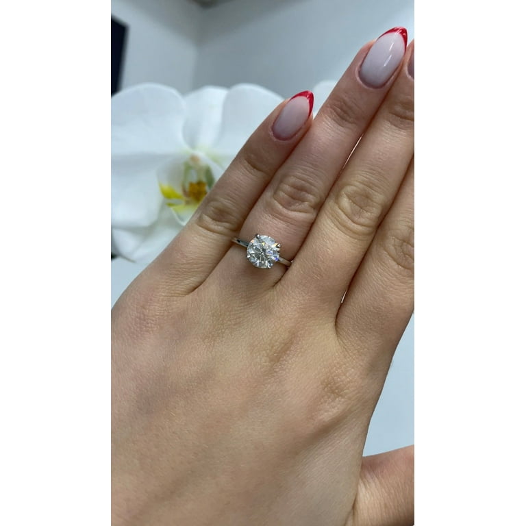 Thin band big store diamond engagement ring