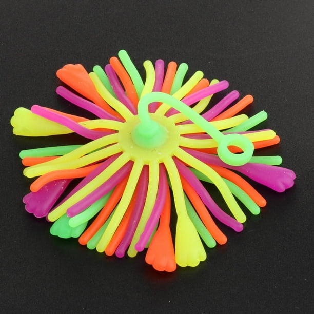 Bouncy ball with elastic string top