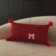 thumbnail image 1 of Almohada De Algodón Cojín decorativo con lazo rojo, 40x60 cm, funda desmontable, ideal para sofá, dormitorio y silla de oficina (1 unidad). JASKFLY, 1 of 8