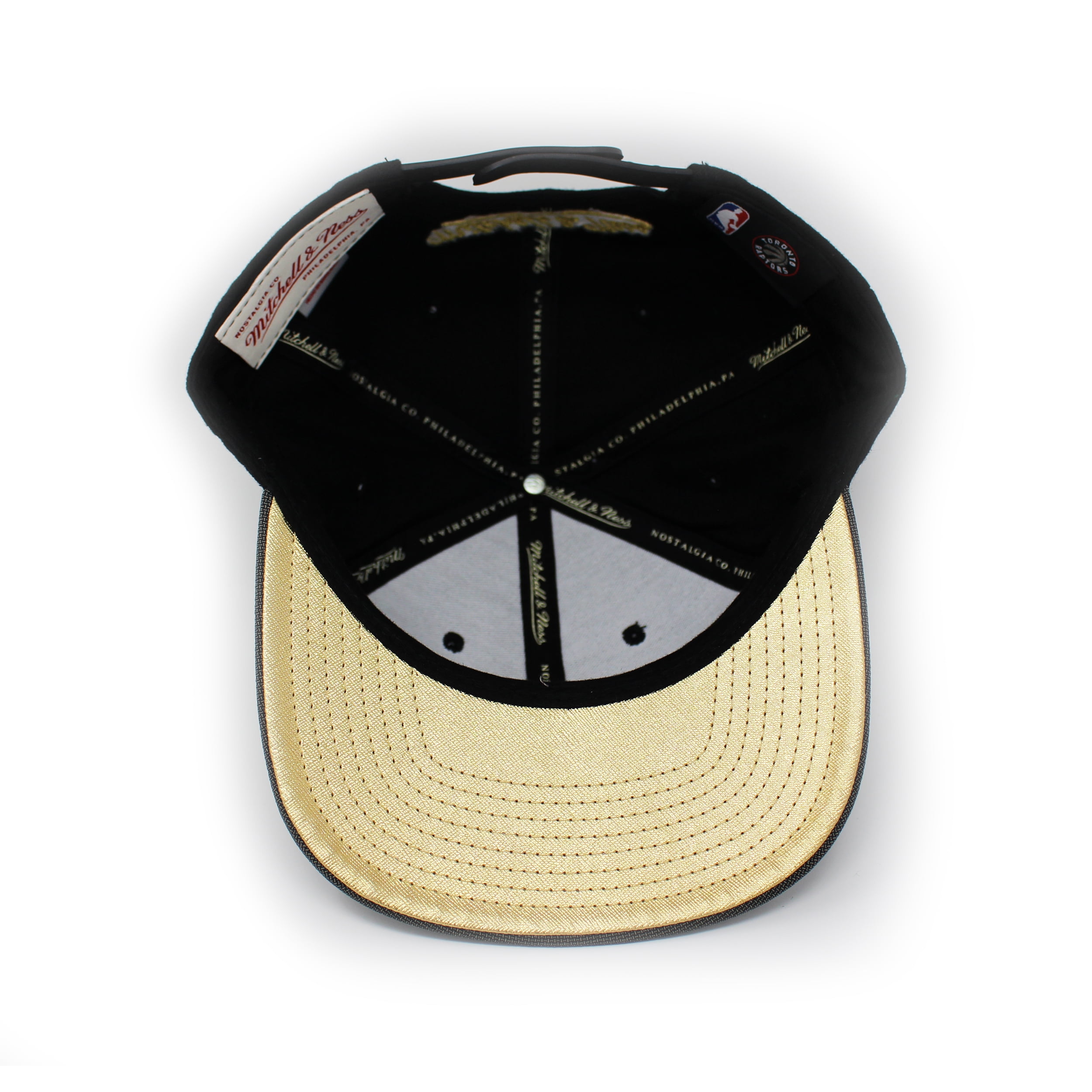 gold raptors hat