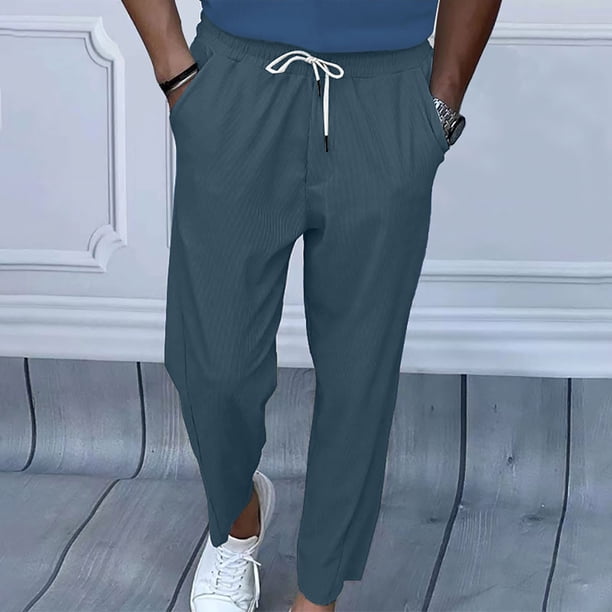 Pantalones largos para hombre con cordón, cintura elástica y bolsillo de color liso, sudadera con capucha y perneras ajustadas, pantalones de chándal de poliéster para hombre.