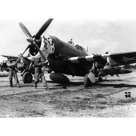 - LAMINATED POSTER A U.S. Army Air Forces Crew chief and assistant pull the propeller through on a Republic P-47D Thumd Poster Print 24 x 36