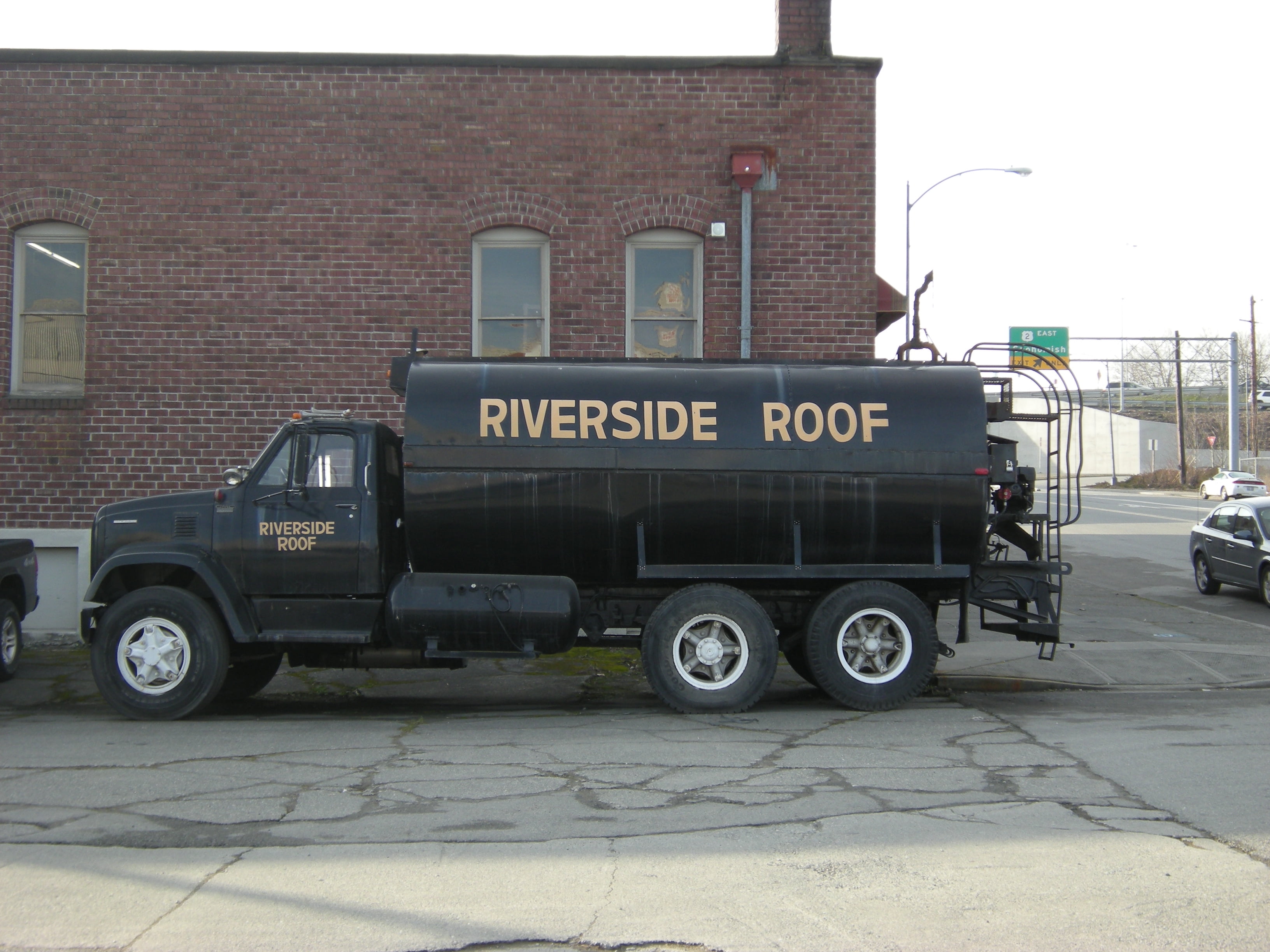 LAMINATED POSTER Riverside Roof tar truck, parked just off Hewitt