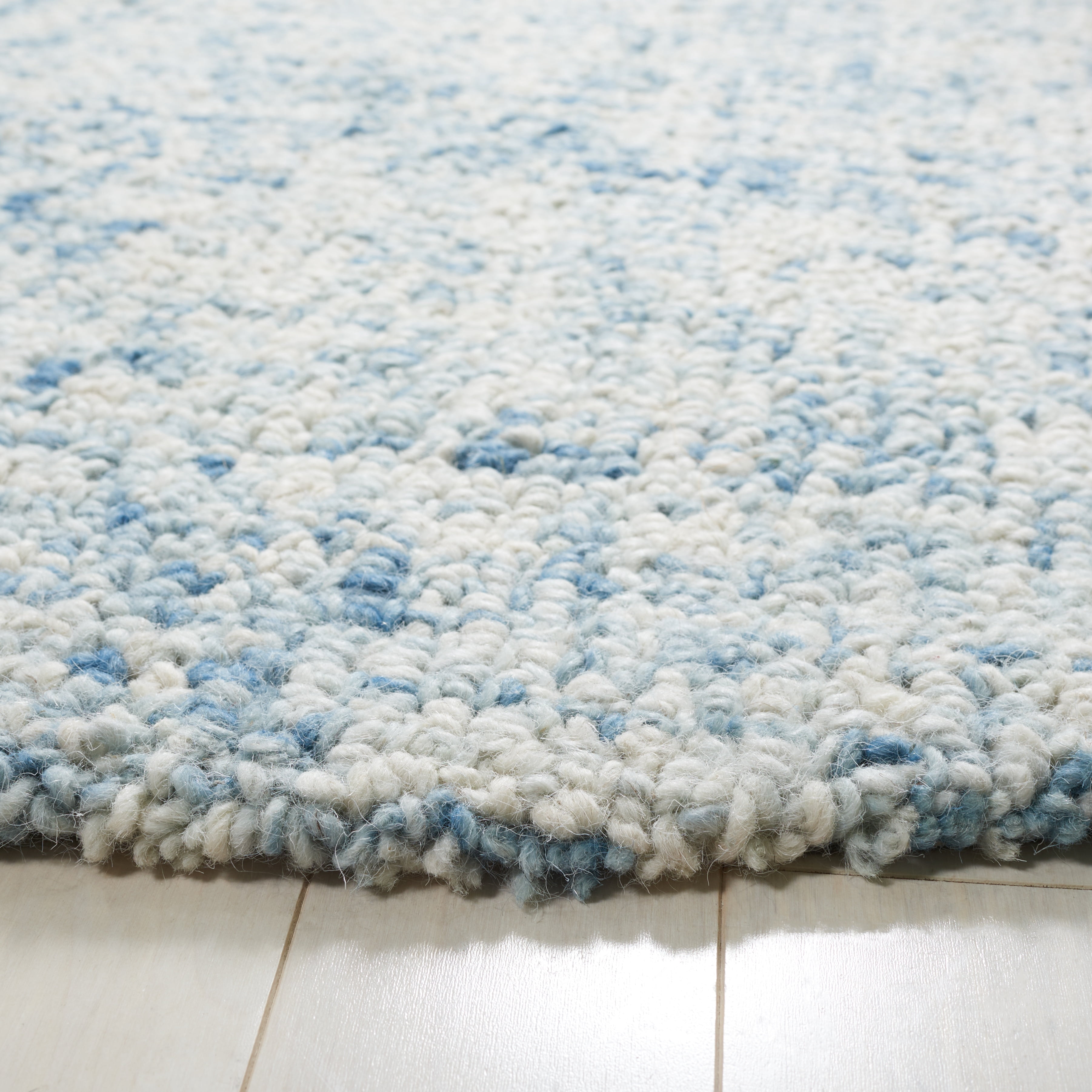 SAFAVIEH Abstract Ethelyn Solid Area Rug, Blue/Ivory, 6' x 6' Round