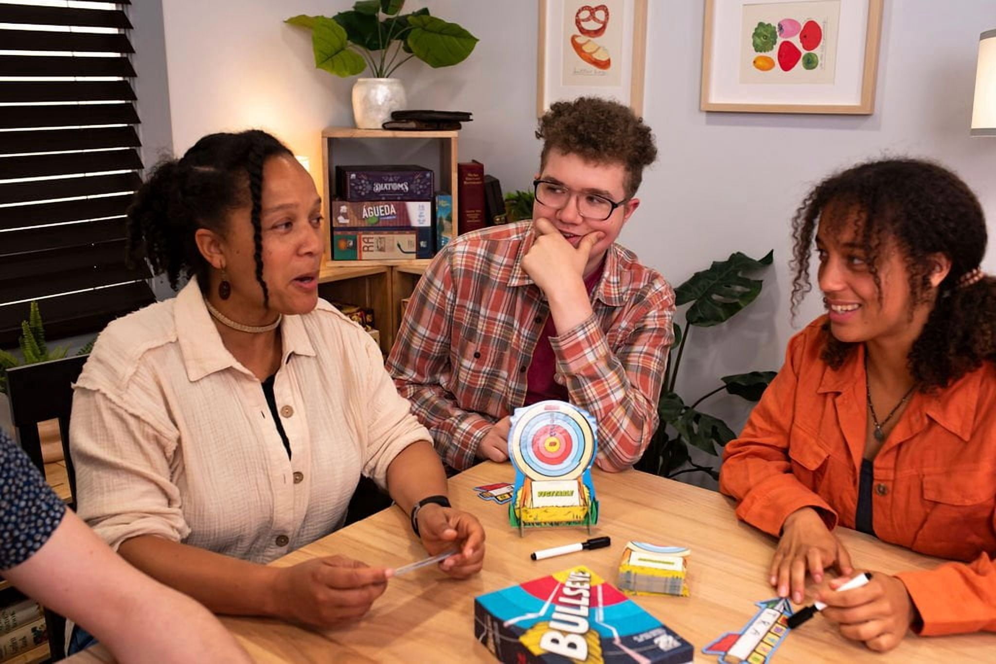 25th Century Games Bullseye Ages 10+ | 3-8 Players | Hilarious Cooperative Party Word Game of Twisted Clues | Letter-by-Letter Guessing & Fast Team Deduction