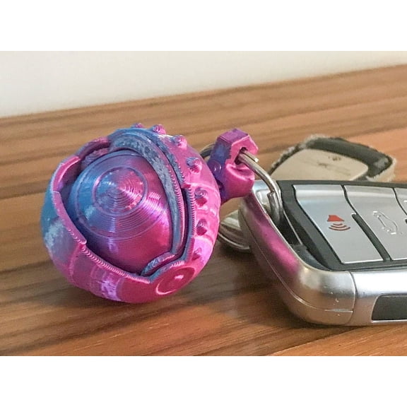 Moving Eye Fidget Keychain – Small Stress Relief Accessory with Opening and Closing Eye