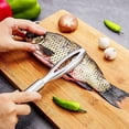 thumbnail image 4 of Báscula de pescado de acero inoxidable, raspador de escamas de pescado de 2 piezas, diseño profesional de dientes de pescado, más rápido y fácil de pelar escamas de pescado, 4 of 5