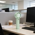 thumbnail image 1 of Miniventilador de mano sin aspas con batería recargable por USB, ventilador personal ligero y portátil para viajes, oficina, hogar y uso al aire libre, disponible en múltiples colores., 1 of 6