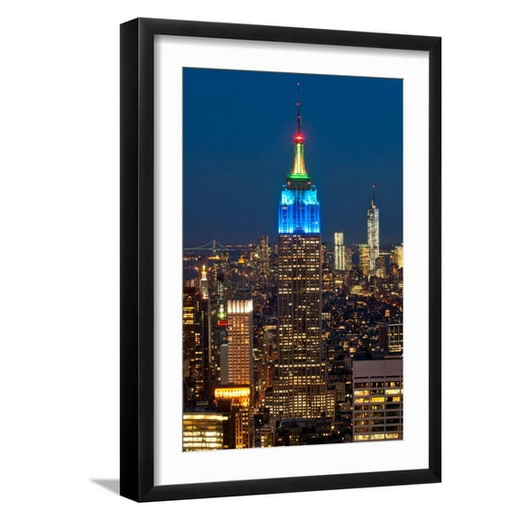 Art.com Skyscrapers Lit Up at Night in a City, Empire State Building, Manhattan, New York City Photographic Print, Black Frame Wall Art, 17" x 23"