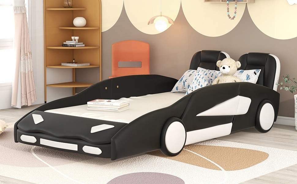 Race Car-Shaped Twin Size Platform Bed in Black Equipped with Wheels and Solid Construction