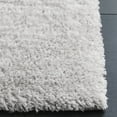 thumbnail image 3 of SAFAVIEH Jasmine Sashka Solid Polyester Shag Area Rug, Light Grey/Ivory, 4' x 6', 3 of 7