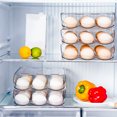 thumbnail image 4 of Auto Rolling Egg Storage Container,  PET Stackable Egg Holder With Transparent Lid, Egg Dispenser For Refrigerator, 4 of 8