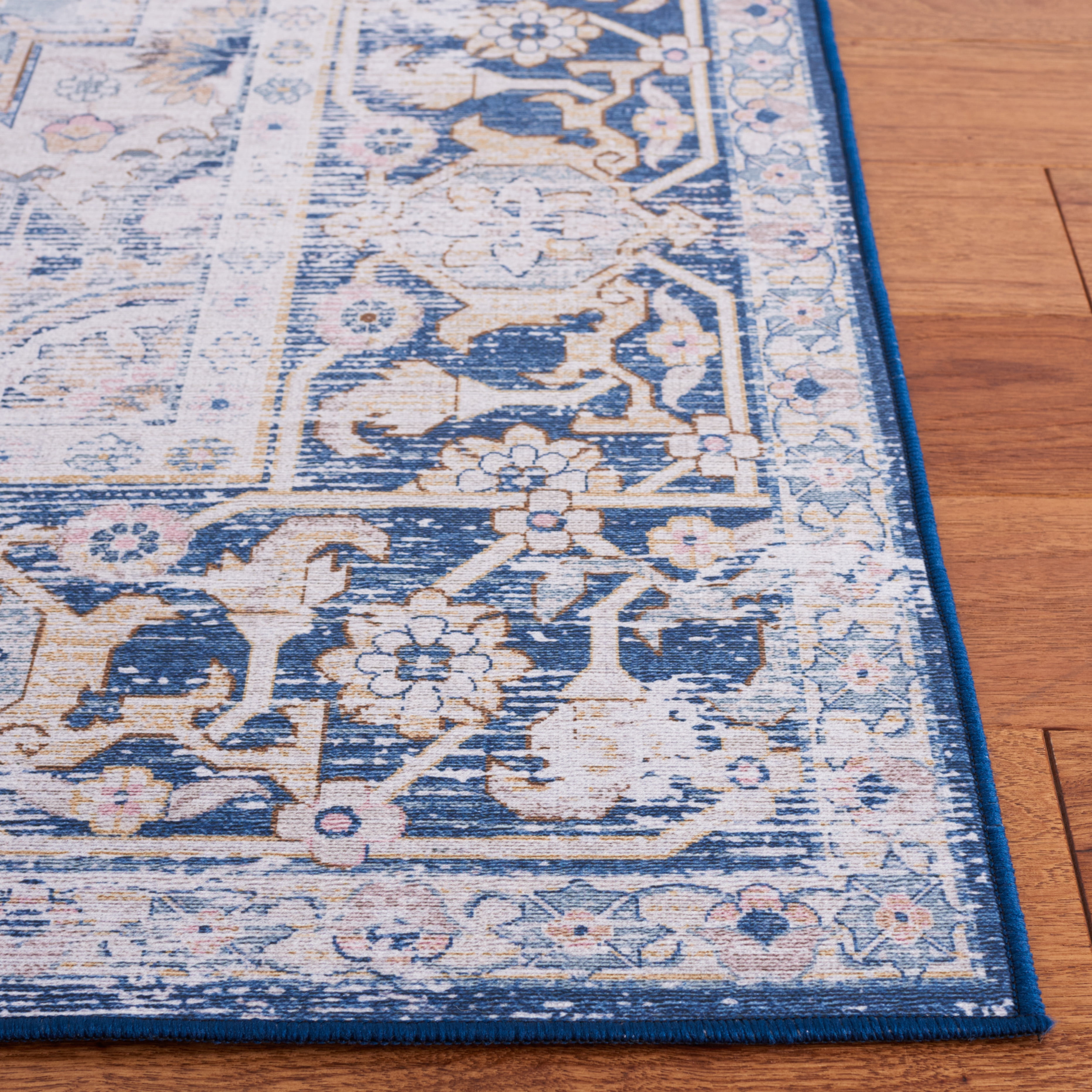SAFAVIEH Tucson Brooke Traditional Machine Washable Area Rug, 6' x 9', Light Blue/Navy