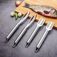 thumbnail image 5 of Báscula de pescado de acero inoxidable, raspador de escamas de pescado de 2 piezas, diseño profesional de dientes de pescado, más rápido y fácil de pelar escamas de pescado, 5 of 5