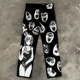 thumbnail image 1 of Pantalones anchos de pierna de gran tamaño con estampado de dibujos animados de estilo retro oscuro de calle para mujer, pantalones lavados de cintura alta de marca de moda Y2k Harajuku, 1 of 4
