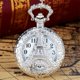 thumbnail image 2 of Reloj de bolsillo de aleación con patrón hueco vintage plateado con personalidad de moda (torre de hierro), 2 of 2