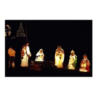 Figurines depicting nativity scene lit up at night Canvas Art - (24 x 18)