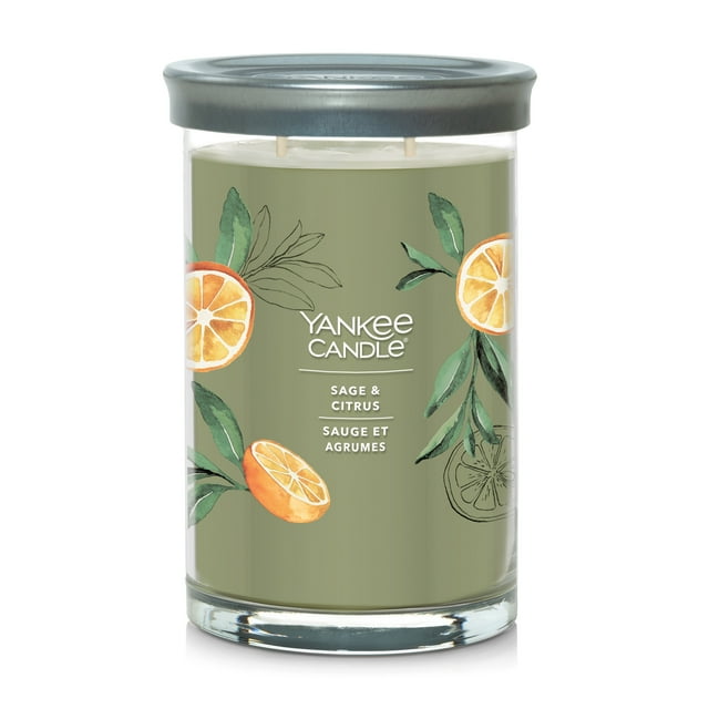 Yankee Candle Signature Large Tumbler scented candle in Sage & Citrus fragrance with green wax and orange citrus fruit illustrations on the glass