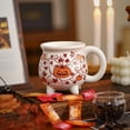 thumbnail image 2 of Multicolor Halloween Cauldron Mug, Footed Ceramic Pumpkin Drinkware, Orange White Black Seasonal Cup, Versatile Tableware for Hot Drinks, Holiday Parties and Daily Use, 2 of 5