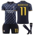 thumbnail image 1 of 2324 Camiseta de fútbol visitante del Real Madrid No. 7 Vinicius 5 Bellingham 10 Modric conjunto de camisetas para niñosRodrigo talla 11 con calcetines a juego, 1 of 3
