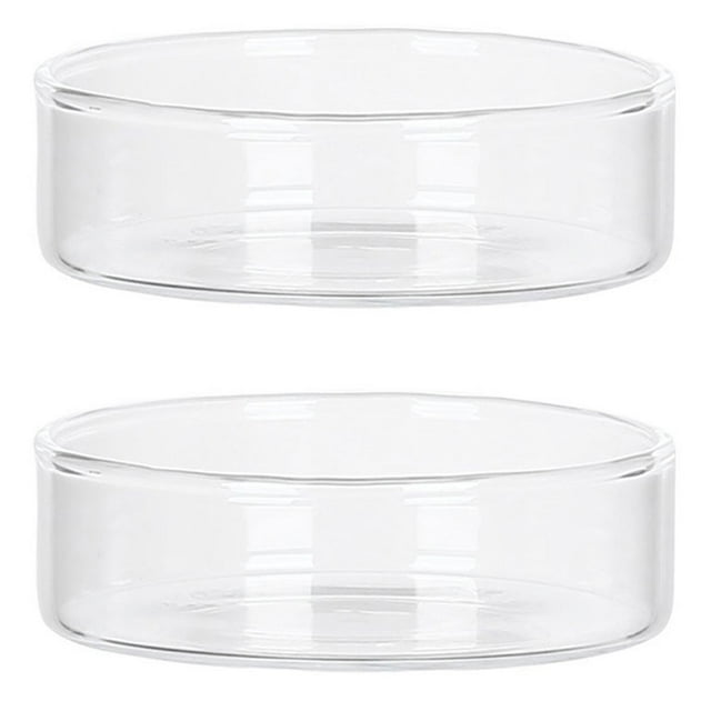 2 bandejas de vidrio para ensalada, platos delicados para postres y frutas, bandeja para alimentos juego de dos bandejas transparentes de vidrio; vista frontal centrada, forma circular y baja, dimensiones aproximadas 8.5 x 8.5 x 2.5 cm, paredes y base lisas con borde redondeado y acabado brillante, ideales para servir postres, frutas y aperitivos; también suelen utilizarse como decoración de mesa.