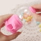 thumbnail image 4 of Dispensador de dulces pequeño, máquina Manual de chicles, soporte de plástico para dulces, máquina de juguete, 4 Uds., 4 of 6