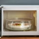 thumbnail image 5 of Cubierta de salpicaduras de microondas | Tapa de plástico apta para alimentos con ventilación de vapor ajustable | Se adapta a la mayoría de los platos y tazones | 10.03in de diámetro | Resistente, 5 of 9