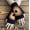 K, variant on Handmade Sunflower Crochet Fingerless Gloves for Women - Cozy Autumn/Winter Accessory