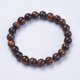 thumbnail image 1 of Pulsera elástica de cuentas de ojo de tigre natural (1 unidad), pulsera curativa para hombres y mujeres, 8 mm., 1 of 3