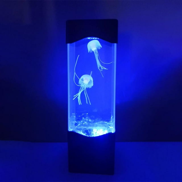 Feltree Jellyfish Aquarium Night Lamp featuring floating jellyfish with a dynamic simulation effect. The lamp emits a soft blue glow, creating a calming mood light. It is USB or AAA battery powered, making it suitable for desktop decor in offices or homes. The rectangular design includes a black base and top, with two lifelike jellyfish suspended in a water-filled tank. Ideal as a novelty lighting piece or gift for kids and adults.