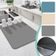 thumbnail image 1 of Tapete de secado de diatomita (1 unidad), tapete de cocina superabsorbente de 50 x 60 cm, escurridor de platos de secado rápido que protege las encimeras para uso diario (beige)., 1 of 9