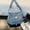 Light Blue, variant on Women's Denim Crossbody Bag, Zip Shoulder Purse with External Open Pocket for Travel