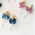 thumbnail image 3 of Clip on matte gold 2 3/4" bent circle blue, pink or brown petal earrings, 3 of 5