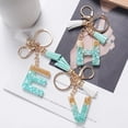 thumbnail image 4 of LLavero de 26 letras verdes de la A la Z para mujer, dijes de billetera, alfabeto inicial, dos colgantes de borla, llaveros de cadena, regalo de joyería, 4 of 4