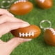 thumbnail image 2 of Paquete de 30 Llaveros de Pelota de Rugby para Recuerdos de Fiesta, Pelota AntiestréS de Rugby, Premio de Escolar, Decoraciones de Centro de Mesa Deportivo, 2 of 5
