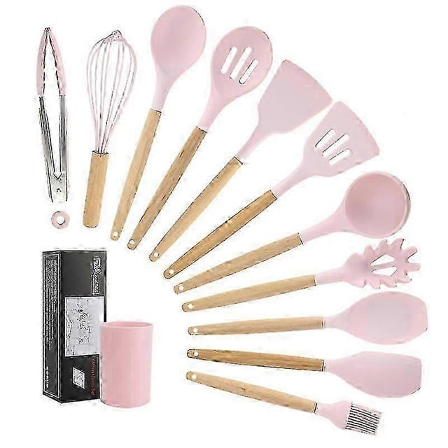 kitchen utensils set 11pcs silicone non-stick barreled cooking utensils set silica gel utensil wooden handle kitchenware set Conjunto de 11 utensilios de cocina con cabezales de silicona rosa y mangos de madera: tong (pinzas), batidor, pincel, cuchara ranurada, espátula ranurada, espátula plana, servidor de pasta, cuchara, spoonula, volteador sólido y cucharón; mangos con orificio para colgar y barril cilíndrico rosa para almacenamiento; resistencia al calor hasta 230°C (446°F); también suele emplearse para organizar utensilios de repostería.