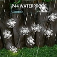 thumbnail image 5 of 100 luces LED solares de Navidad con forma de copo de nieve para exteriores, 39 pies, impermeables, con energía solar, luces de cadena de copo de nieve para árbol de Navidad, vacaciones, fiesta de boda, decoraciones de patio (copo de nieve blanco) Rojo Verde RV1016-0122813FYD, 5 of 5