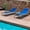 Blue W/ Table, variant on Kozyard Wilson Adjustable EDP Coated Wrought Iron Chaise Lounge Chair (2 Pack, Blue)