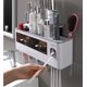 thumbnail image 4 of Soporte para cepillo de dientes, artículo multifunción para el hogar, exprimidor automático de pasta de dientes, estantes de almacenamiento, accesorios de baño, (tres tazas-gris) JM, 4 of 5