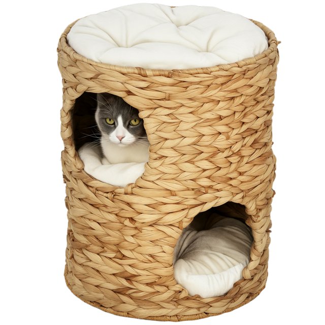 2-Storey Cat Condo Barrel, Small Cat Tree Tower with Cushions, Light Brown. A compact, hand-woven water hyacinth cat furniture piece featuring two cozy hideaways with circular entry holes and a top perch for lounging. Includes soft white cushions for comfort and a rustic design. Ideal for kittens under 7.7 lbs (3.5 kg).