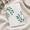 Greenery Eucalyptus Pattern, variant on 50 Pack Colorful Wildflowers No.2 Pre-Folded Vellum Invitation Sleeves for 5x7 Invitations