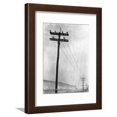 thumbnail image 1 of Telephone Poles in Snowy Weather Framed Print Wall Art Sold by Art.Com, 1 of 5