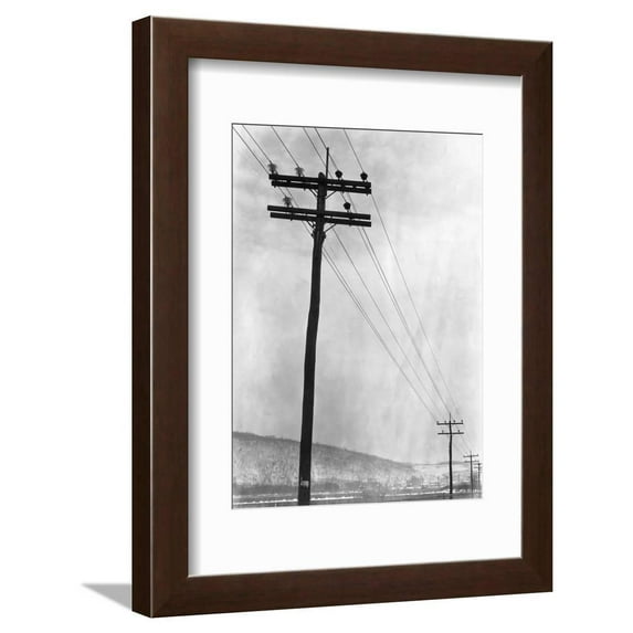 Telephone Poles in Snowy Weather Framed Print Wall Art Sold by Art.Com