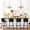26" Black, variant on Carolayne Set of 4 Modern Faux Leather Bar Stools, 26” Counter Height for Kitchen Island, Dark Brown