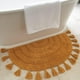 thumbnail image 1 of Alfombra de baño bohemio KIBAGA semicircular, 100% algodón, con borlas, 1 of 9