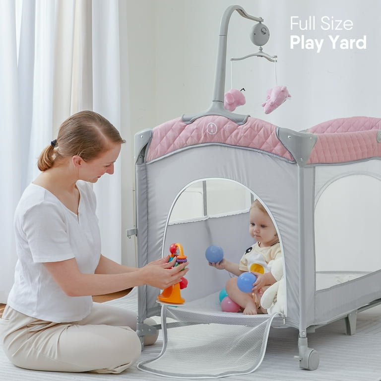 Babyomi Multifunctional Co Sleeper Bassinet with Adjustable Height Pink with 3 Hanging Toys