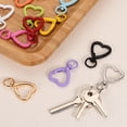 thumbnail image 4 of Ganchos de resorte giratorio Uxcell, gancho de llavero de aleación de zinc, llaveros en forma de corazón 15 piezas, 4 of 6