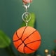 thumbnail image 3 of KAKOWELY 2 llaveros creativos de baloncesto esponjosos, llavero de pelota de peluche, llaveros deportivos para mochila, llavero novedoso de pelota deportiva, colgantes de baloncesto., 3 of 5